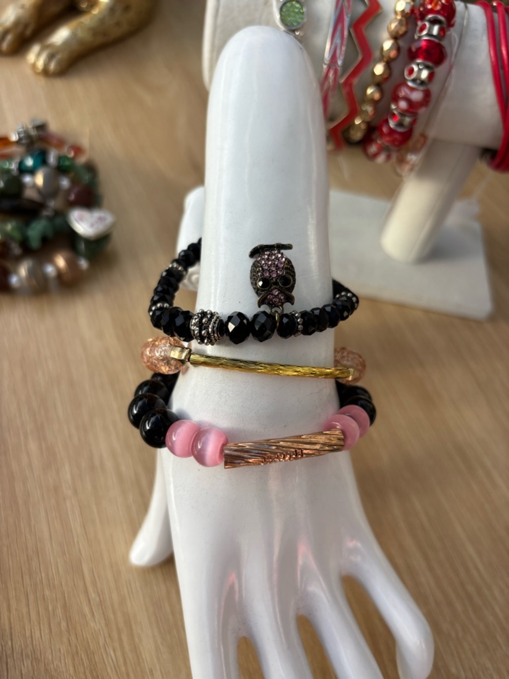 Stacked Beaded Bracelets in Black and Pink with Gold Accent